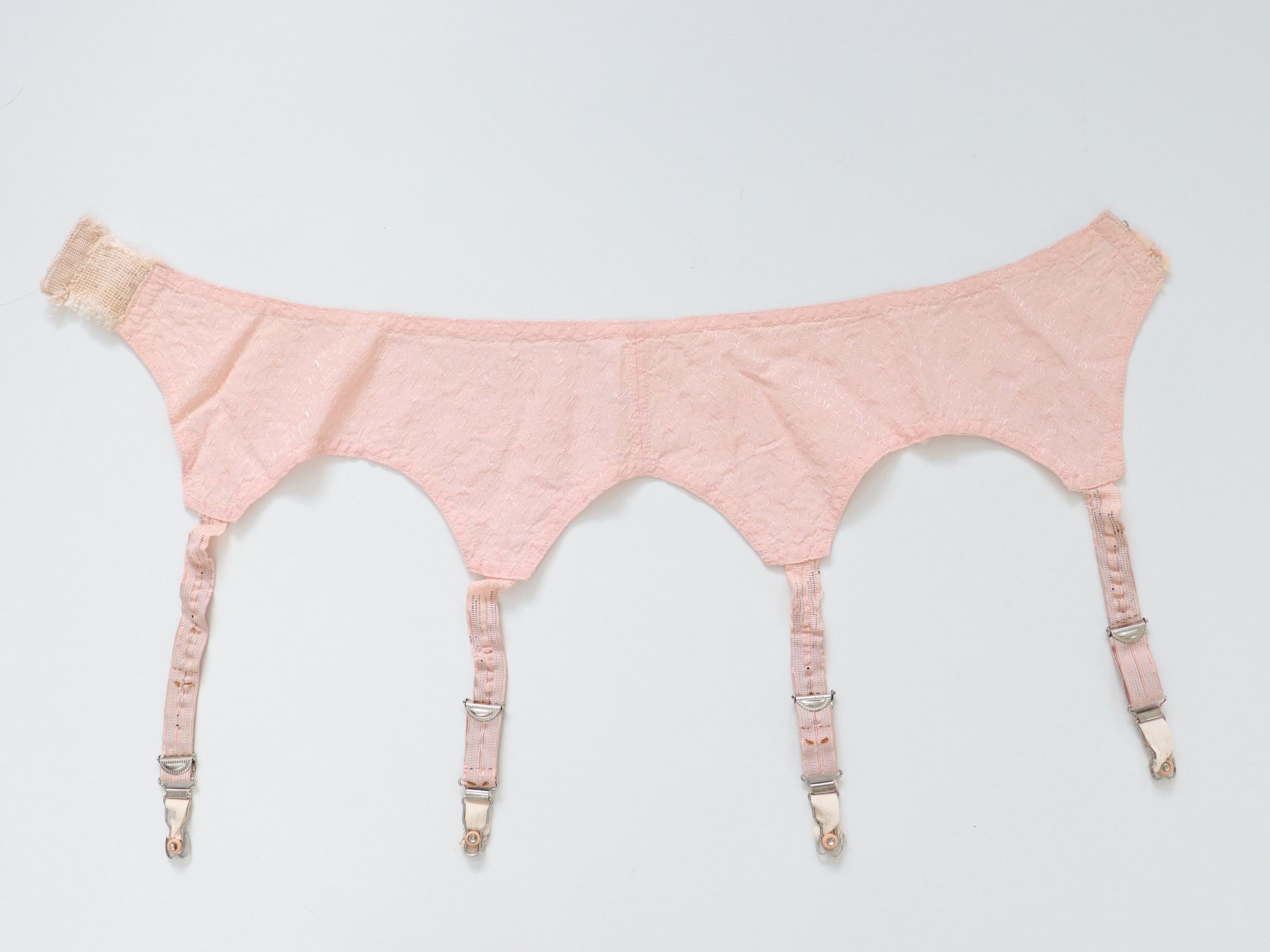 C1940s vintage pink satin suspender