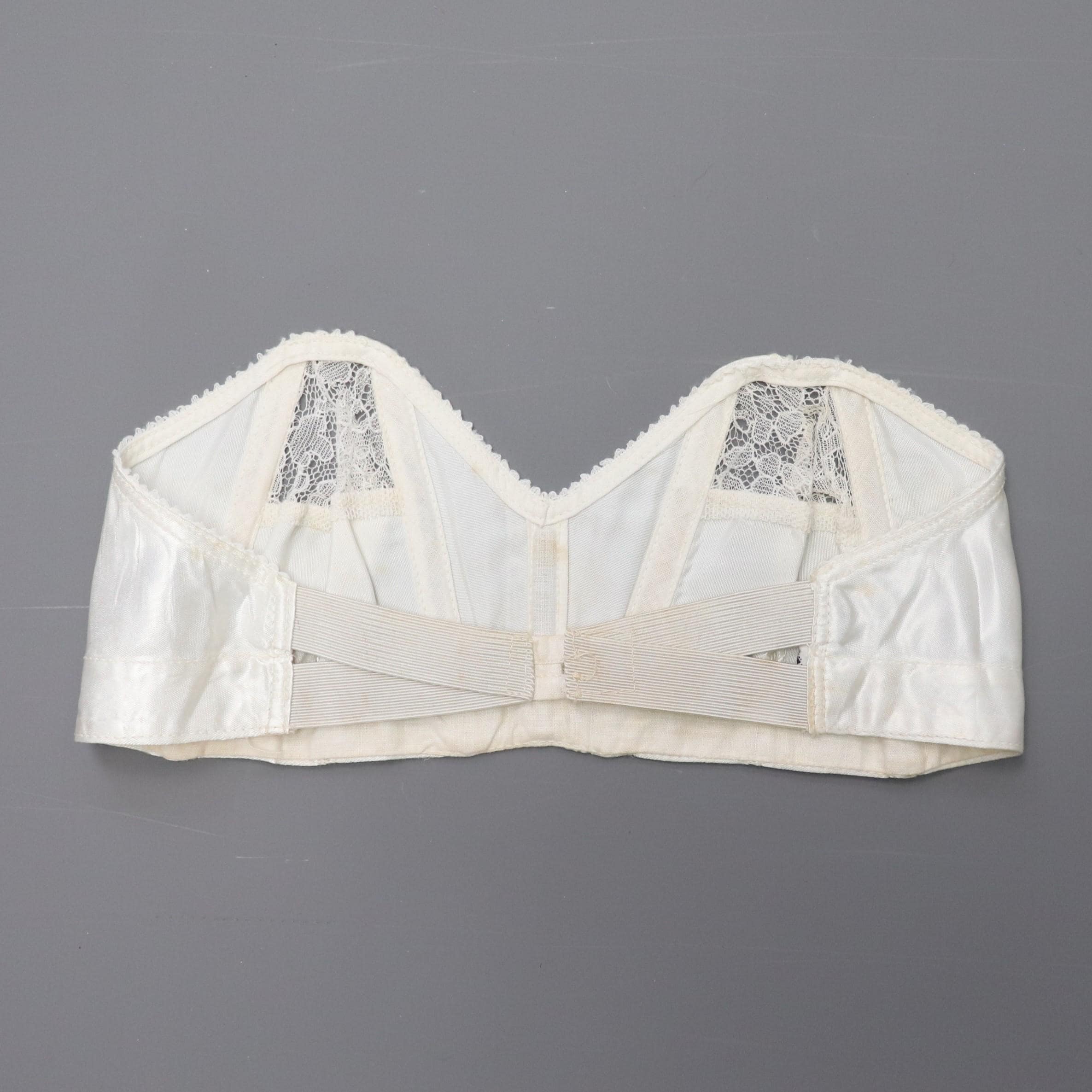 C1950s vintage 'San's Co Peony' boned cathedral bra, white strapless satin and lace bra