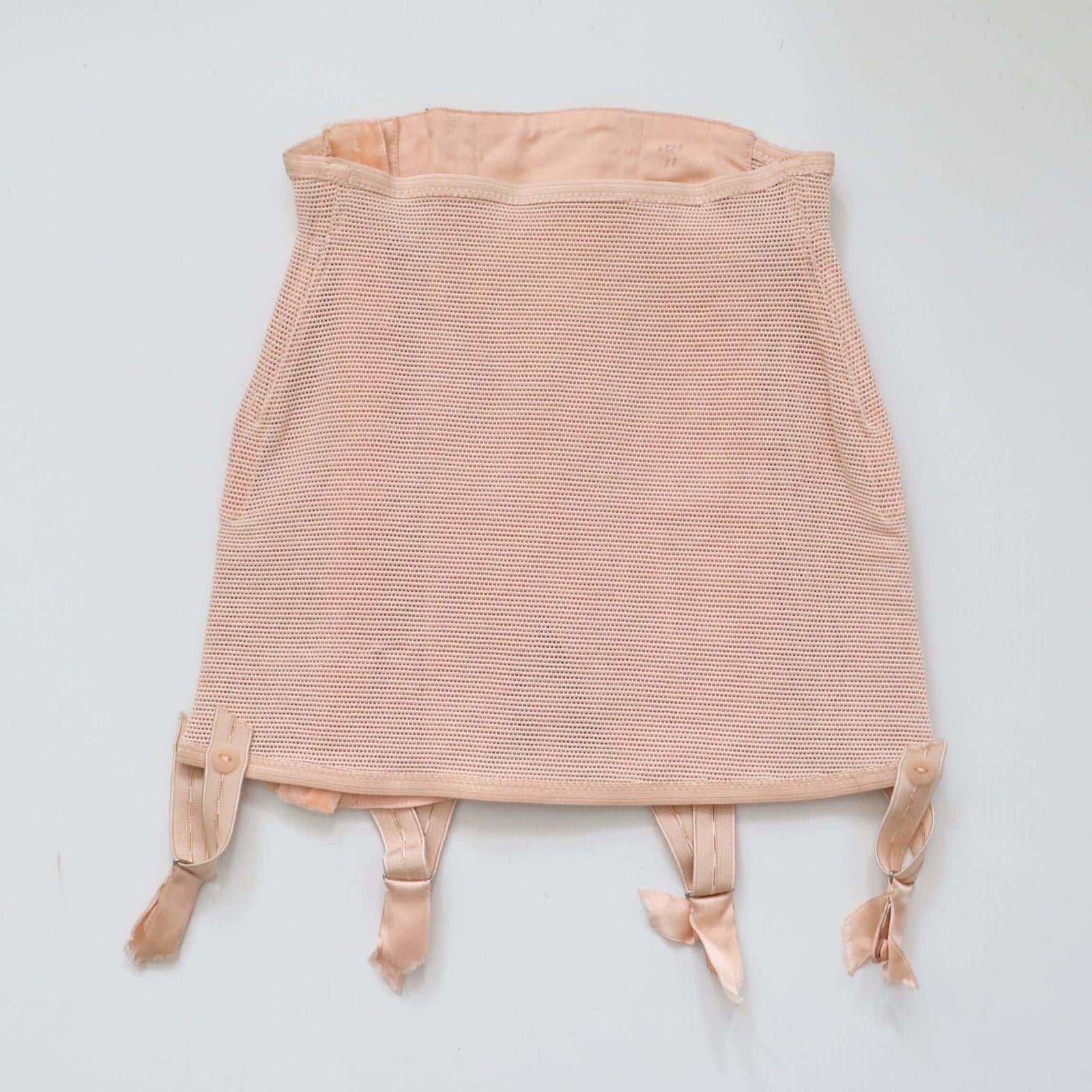 C1940s vintage French pink satin corset girdle with elastic webbing panels