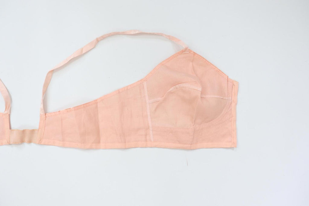 C1940s vintage pink button front longline bra