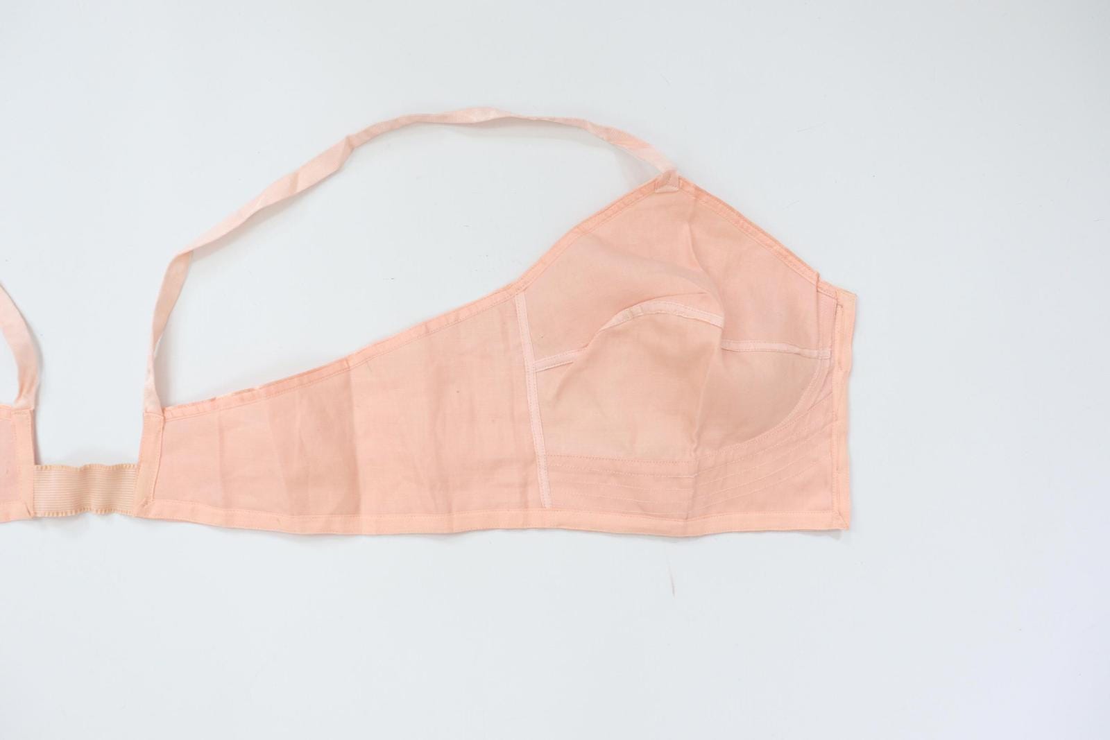 C1940s vintage pink button front longline bra