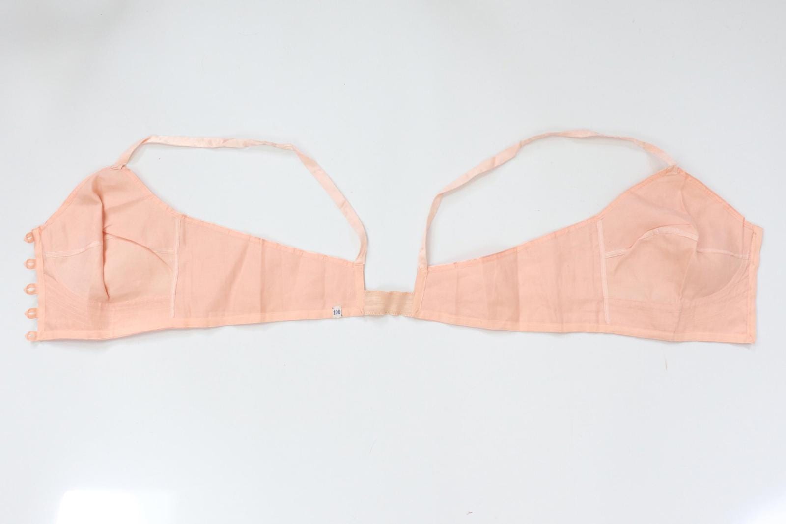 C1940s vintage pink button front longline bra