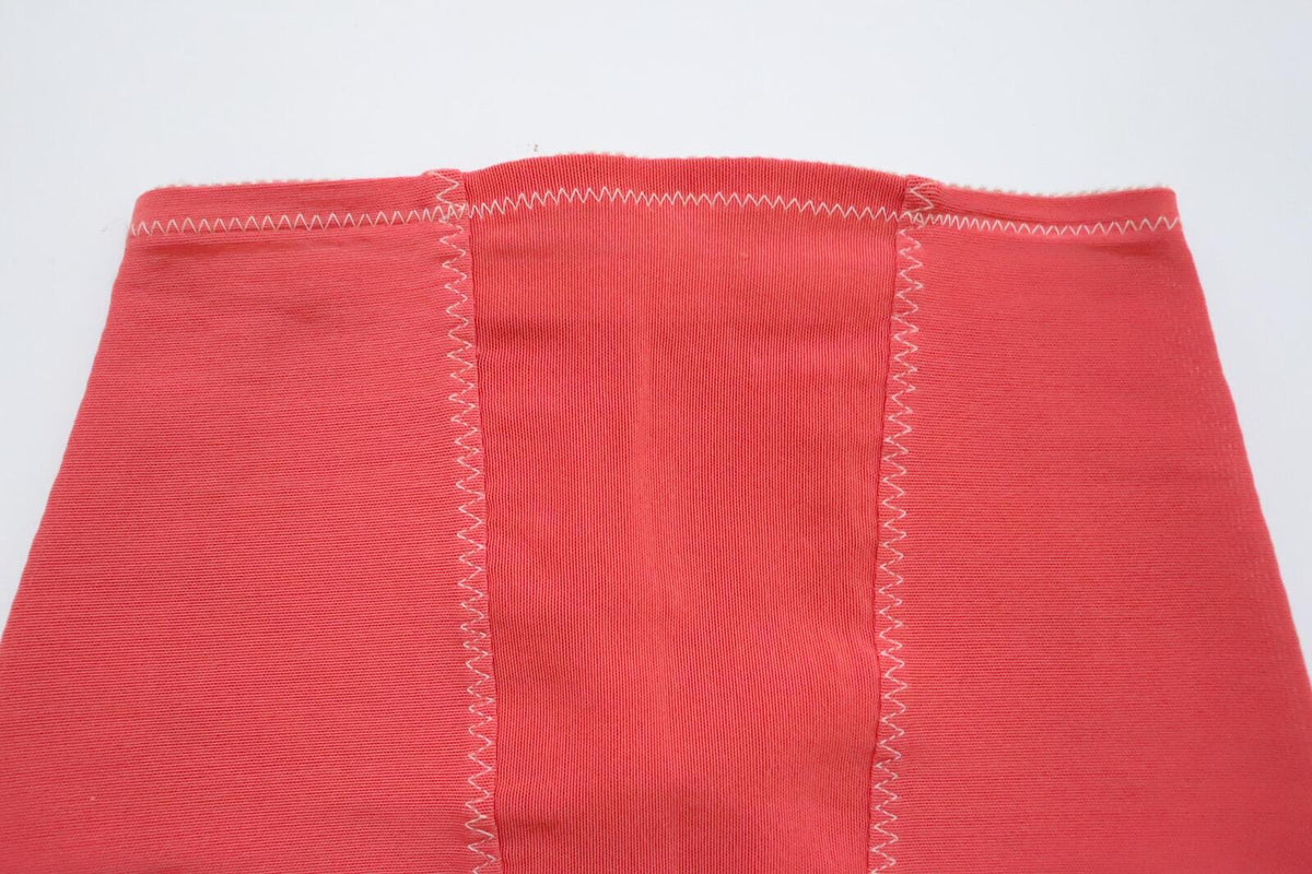 C1960s Vintage coral pink roll on corset girdle - waist 23-27 inch,