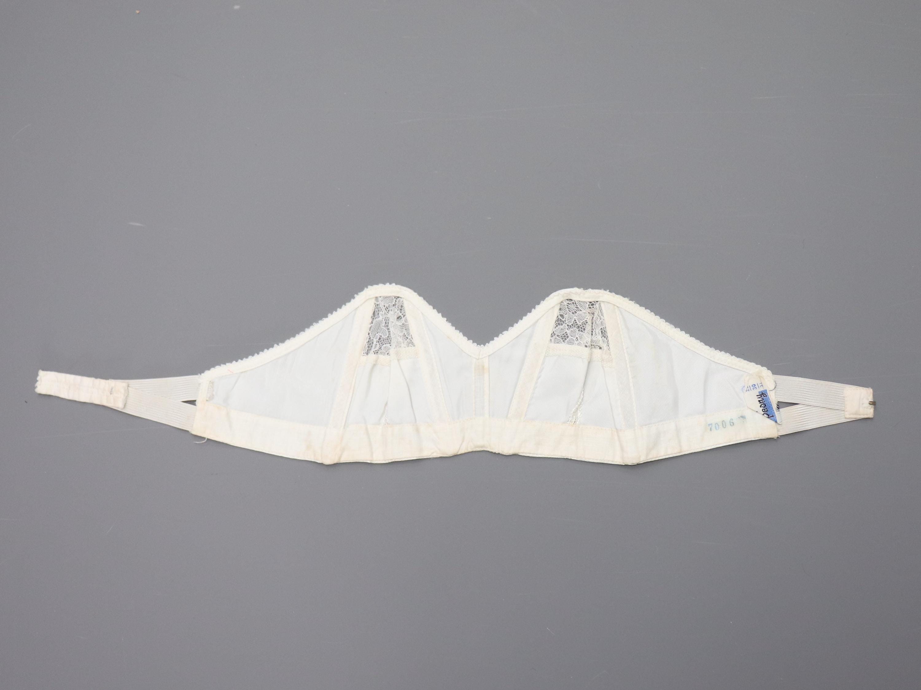 C1950s vintage 'San's Co Peony' boned cathedral bra, white strapless satin and lace bra