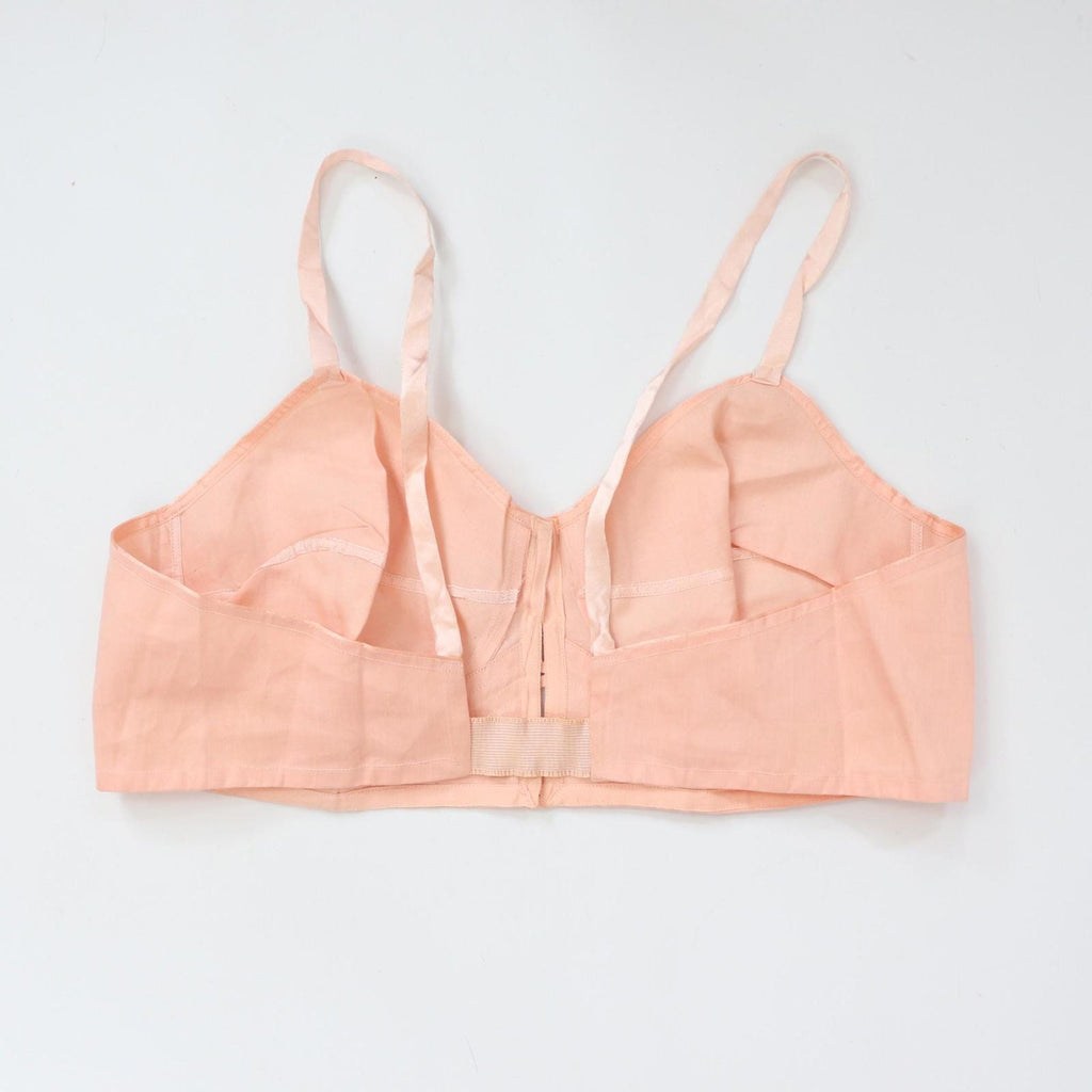 C1940s vintage pink button front longline bra