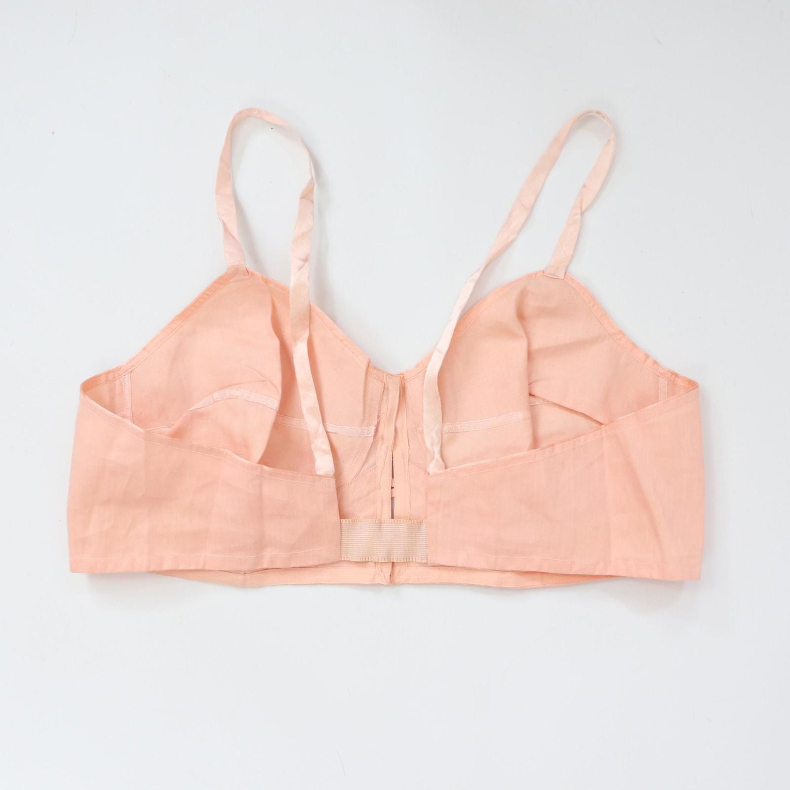 C1940s vintage pink button front longline bra
