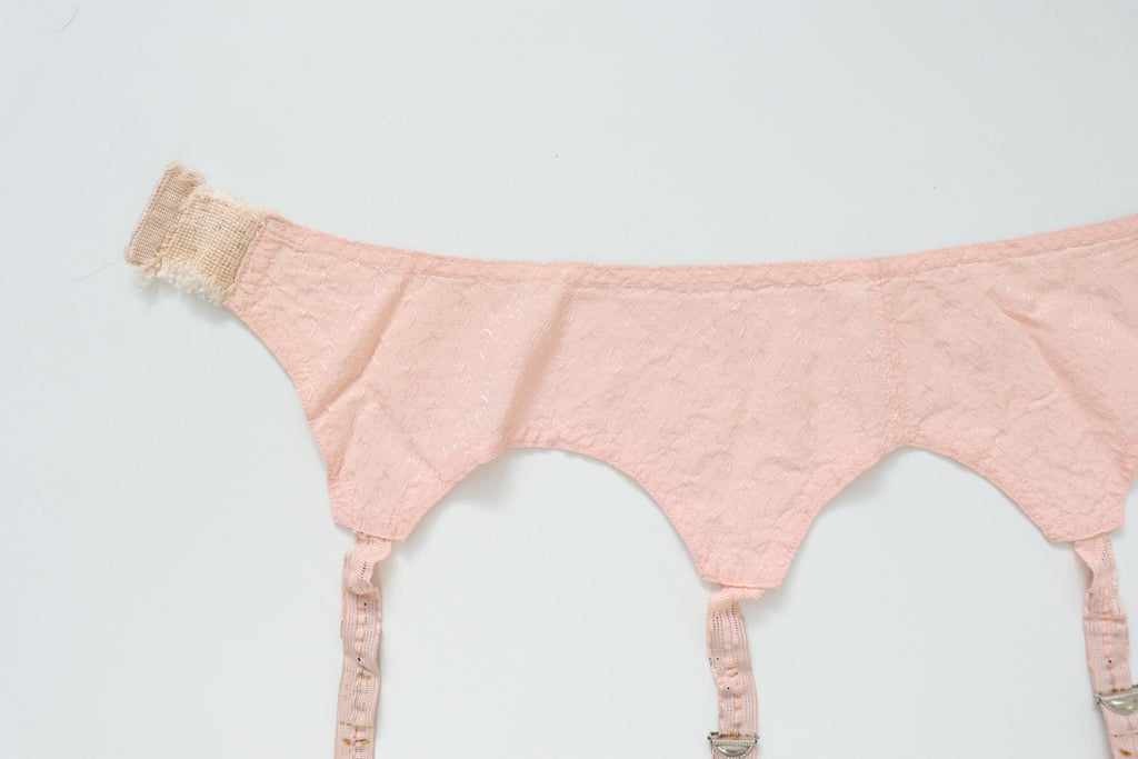 C1940s vintage pink satin suspender