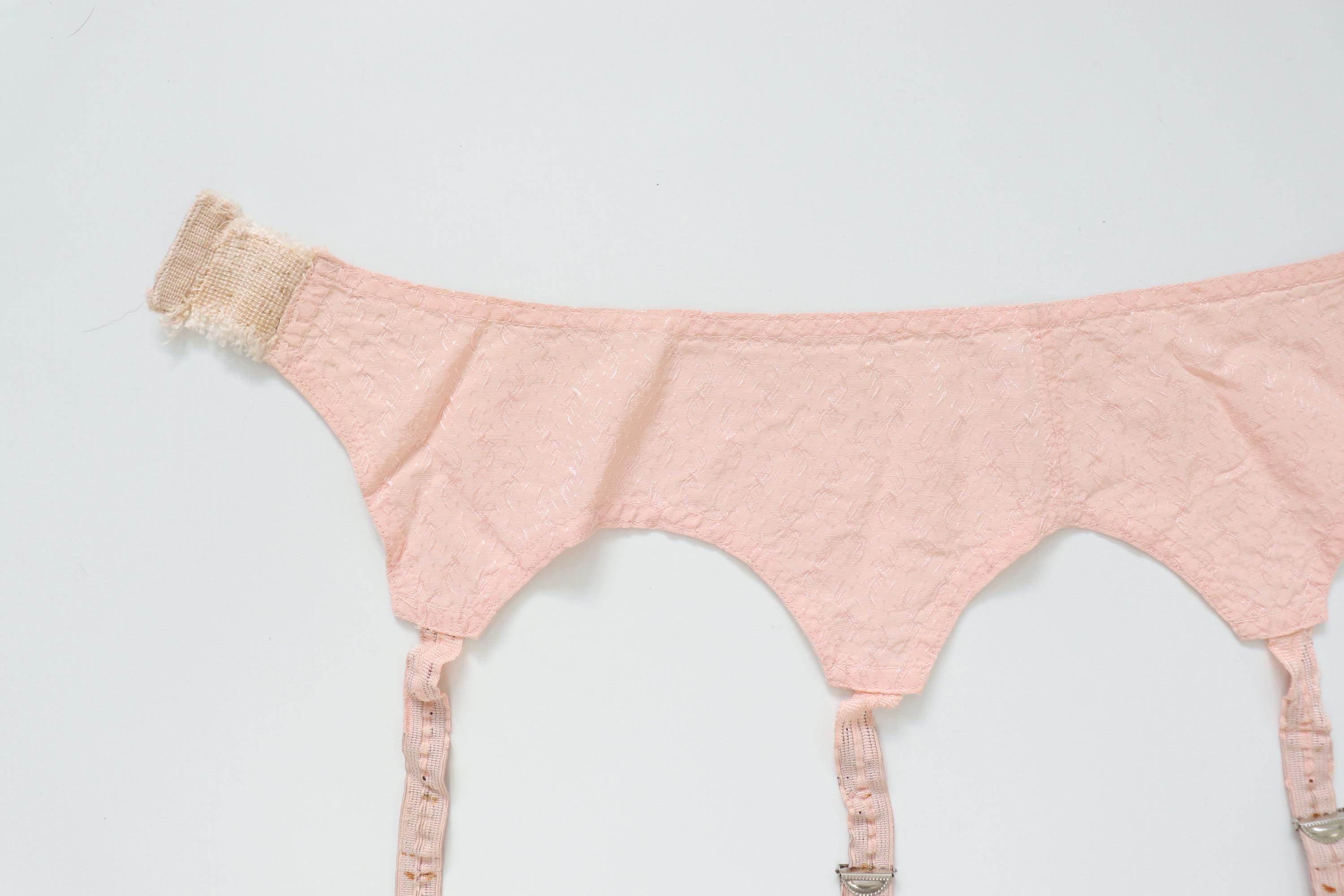 C1940s vintage pink satin suspender