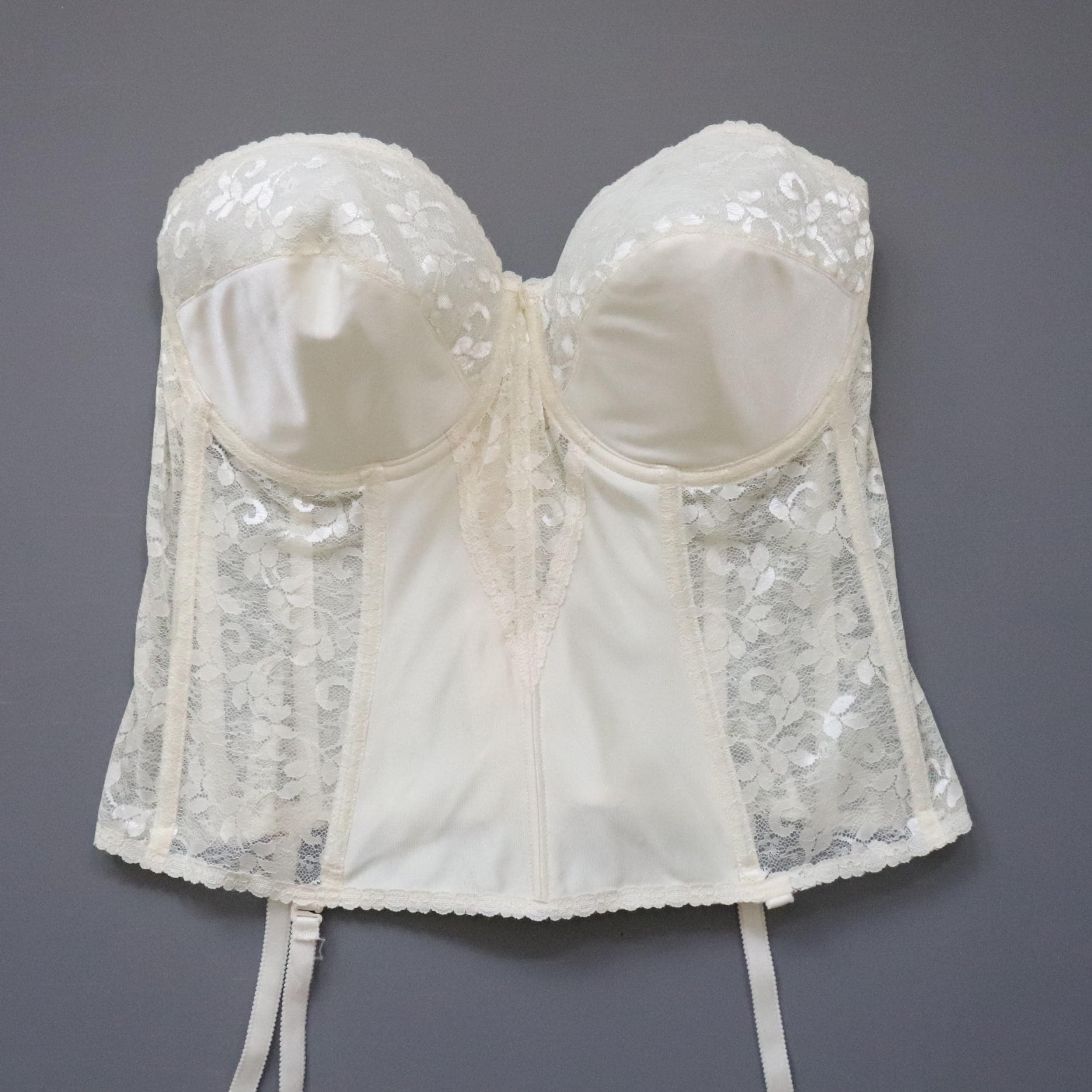 Vintage Carnival cream cupped bustier corset, size 42D