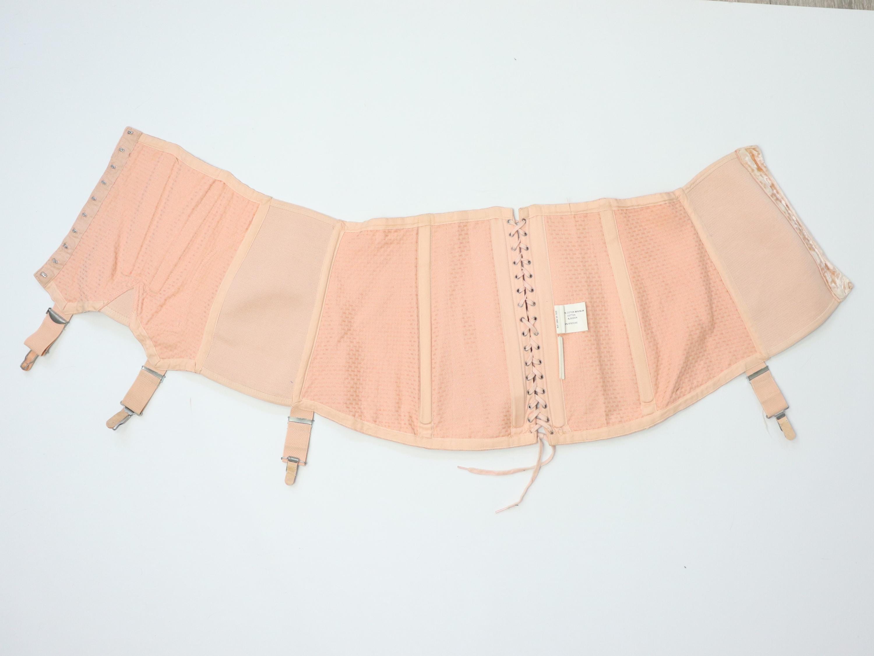 C1950s vintage pale pink corset girdle with back lacing