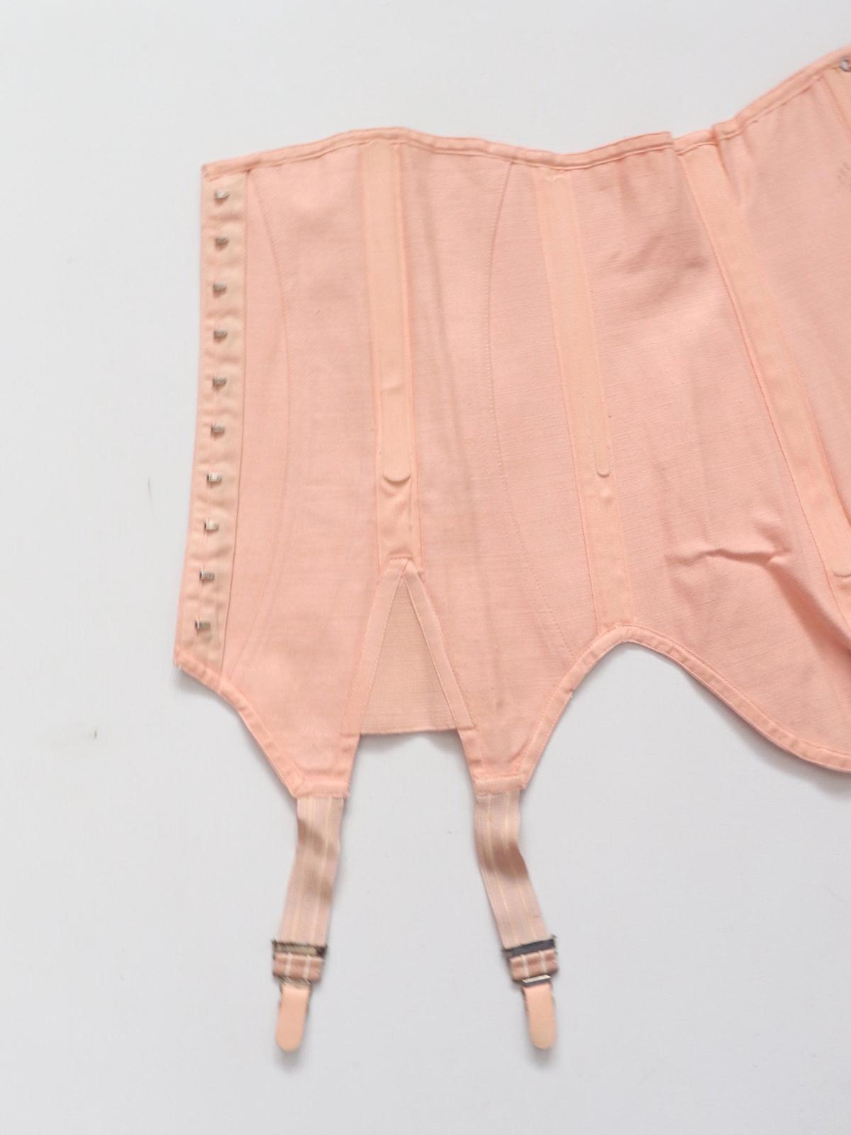 C1940s C1950s vintage pink coutil corset girdle with back lacing - 23 inch waist