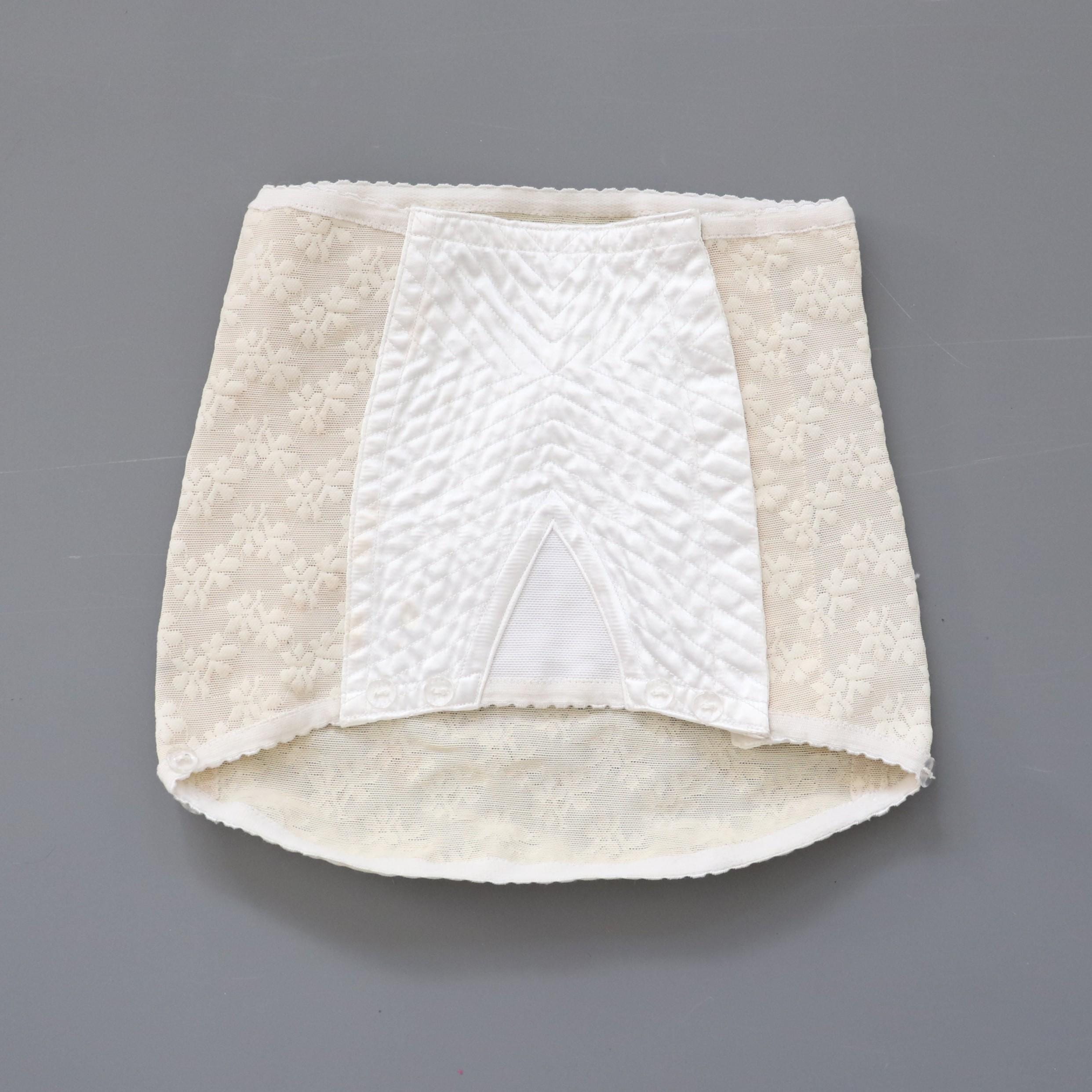 C1950s vintage cream embossed powernet and satin roll on corset girdle. 20-23" Waist