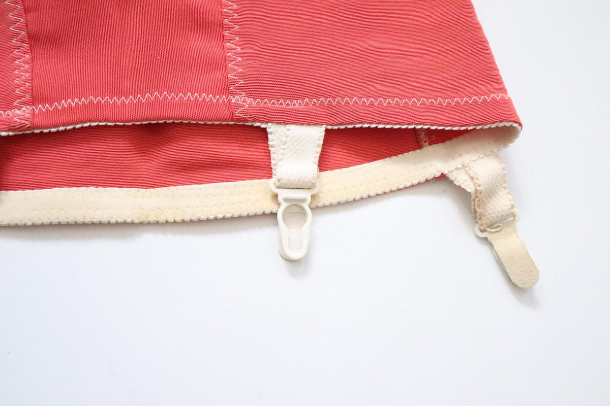 C1960s Vintage coral pink roll on corset girdle - waist 23-27 inch,